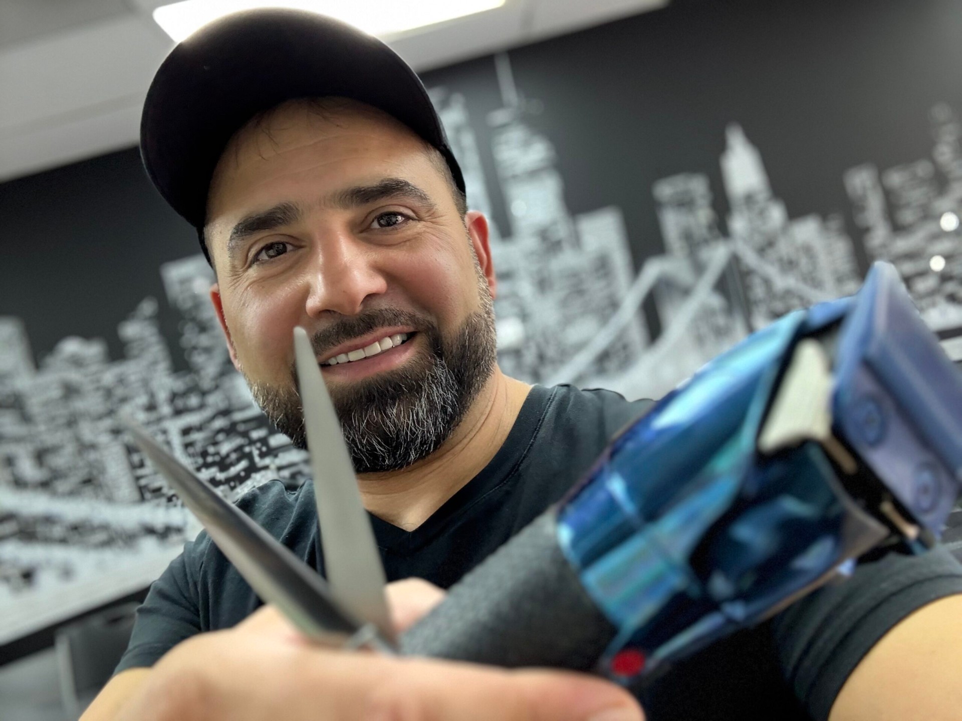Ariel Aminov - Owner and Executive Barber at Wise Guys Barbershop Denver specializing in precision fades and razor shaves