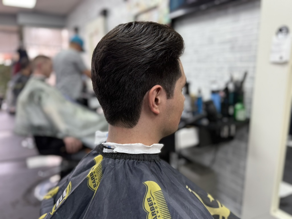 Classic gentleman's fade haircut at a Lowry area Denver barbershop